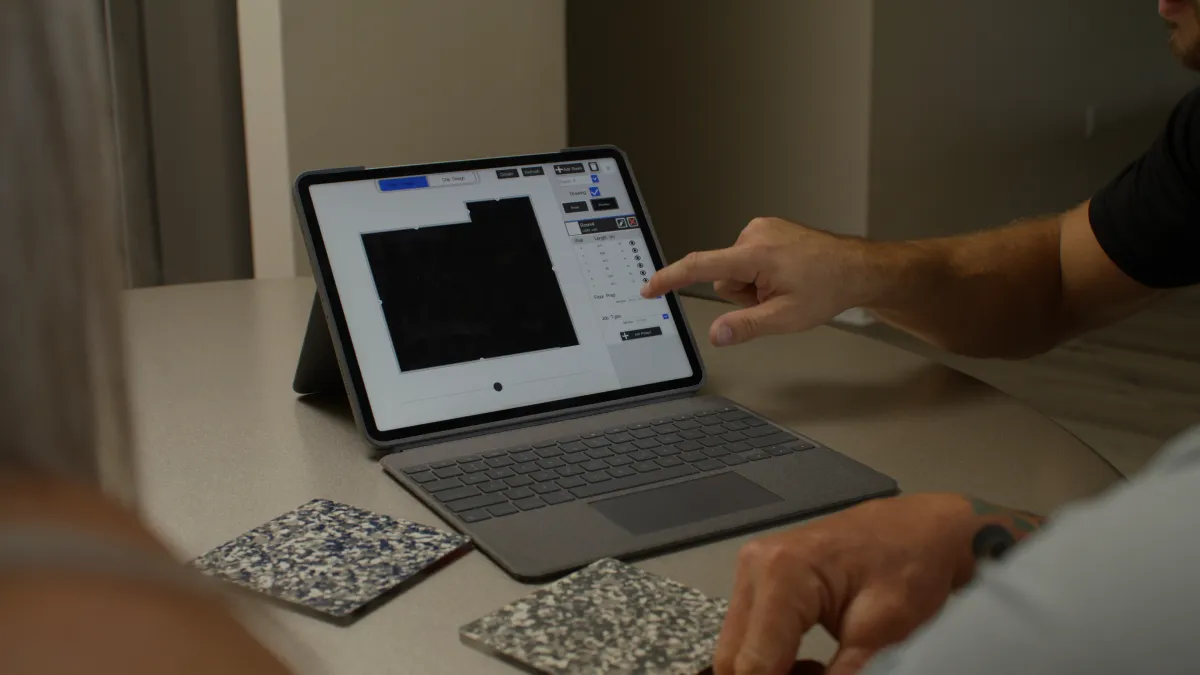 Sales representative reviewing flake samples with a customer