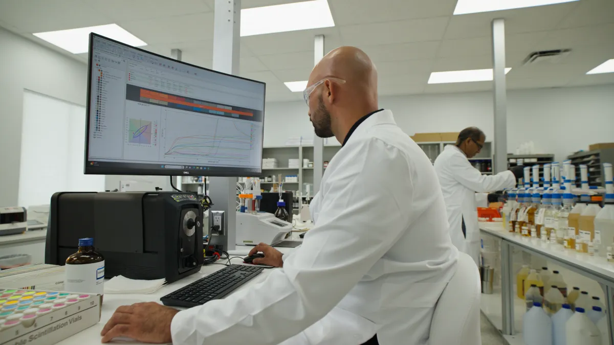 FloorTek technician working in the lab